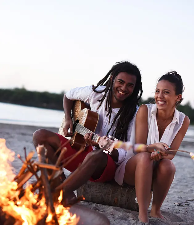 Veranda Tamarin Playing Music on the beach